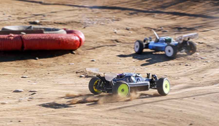 RC cars cornering on a race track